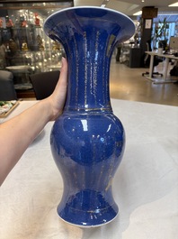 A pair of Chinese gilt-decorated powder-blue 'yenyen' vases, Kangxi