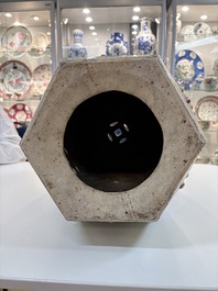 A Chinese famille rose blue and yellow-ground hexagonal garden seat, 19th C.