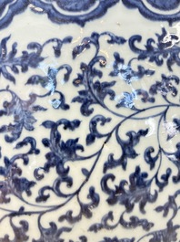 A fine Chinese blue, white and copper-red 'lotus scroll' fish bowl, Qianlong