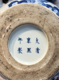A Chinese blue, white and copper-red garlic-mouth vase with mythical animals, Kangxi mark, 19th C.