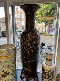 A massive Chinese famille noire 'prunus blossoms' vase, Kangxi mark, 19th C.