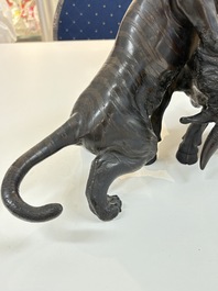 A Japanese bronze okimono of a tiger and a bull, signed Sano Takachika 佐野隆親, Meiji, 19th C.