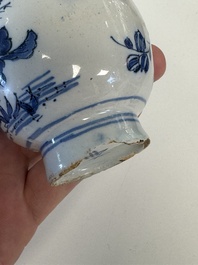 A blue and white Dutch Delft vase with silver cover, 18th C.