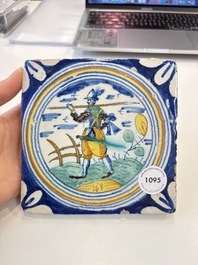A polychrome Dutch Delft maiolica 'soldier' ​​medallion tile, late 16th C.