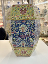A Chinese famille rose blue and yellow-ground hexagonal garden seat, 19th C.