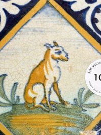 A small polychrome Dutch Delft maiolica 'dog' tile, late 16th C.