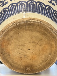 A massive Chinese blue and white 'lotus scroll' fish bowl, Qianlong/Jiaqing