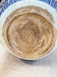 A fine Chinese blue, white and copper-red 'lotus scroll' fish bowl, Qianlong