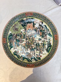 A massive Chinese famille verte dish with narrative design, 19th C.