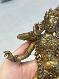 A Nepalese or Tibetan turquoise-inlaid gilt-bronze sculpture of Kurukulla or Red Tara, 15th C. or later
