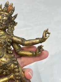 A Nepalese or Tibetan turquoise-inlaid gilt-bronze sculpture of Kurukulla or Red Tara, 15th C. or later