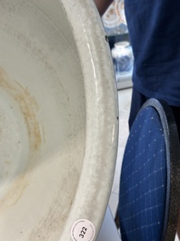 A massive Chinese blue and white 'lotus scroll' fish bowl, Qianlong/Jiaqing