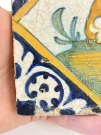 A small polychrome Dutch Delft maiolica 'dog' tile, late 16th C.