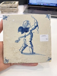 Six blue and white Dutch Delft 'figure' tiles , 17th C.