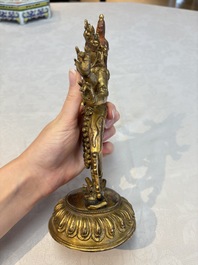 A Nepalese or Tibetan turquoise-inlaid gilt-bronze sculpture of Kurukulla or Red Tara, 15th C. or later