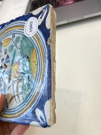 A polychrome Dutch Delft maiolica 'soldier' ​​medallion tile, late 16th C.