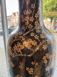 A massive Chinese famille noire 'prunus blossoms' vase, Kangxi mark, 19th C.