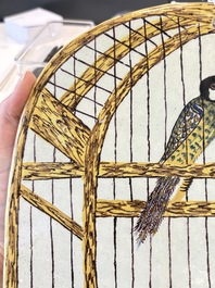 A polychrome Dutch Delft 'bird cage' plaque, 18th C.