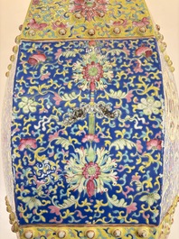 A Chinese famille rose blue and yellow-ground hexagonal garden seat, 19th C.