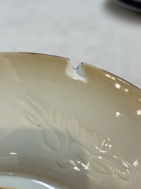 A Dutch-decorated Chinese plate, an Imari-verte dish and a blue and white dish, Kangxi/Yongzheng