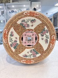 A pair of Chinese famille rose 'dragon and phoenix' garden seats, 19/20th C.