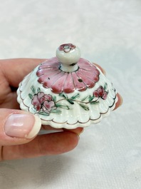 A Chinese famille rose 'roosters' covered teapot and two cups and saucers, Yongzheng