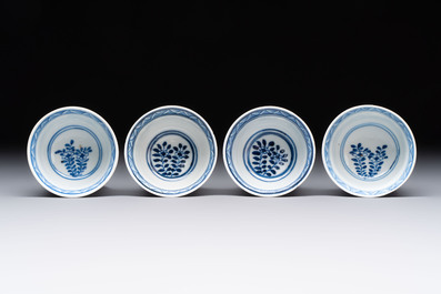Ten Chinese blue and white cups and nine saucers, Kangxi mark, 19th C.