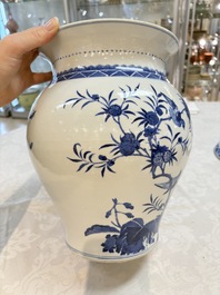 A Chinese blue and white 'birds among flowering branches' vase and cover, 19th C.
