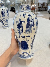 A Chinese blue and white garniture of four vases with figural design, Kangxi mark, 19th C.