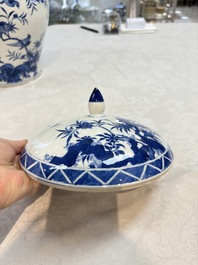 A Chinese blue and white 'birds among flowering branches' vase and cover, 19th C.