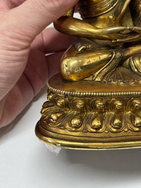 A fine Sino-Tibetan gilt-bronze figure of Buddha Shakyamuni, 17th C.