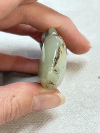 Two Chinese celadon, white and russet jade carvings, 18/19th C.