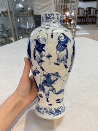 A Chinese blue and white garniture of four vases with figural design, Kangxi mark, 19th C.