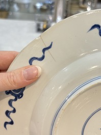 A Dutch-decorated Chinese plate, an Imari-verte dish and a blue and white dish, Kangxi/Yongzheng