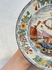 A rare Chinese Dutch-decorated 'The miracle of Zaandam' plate and cup, Qianlong