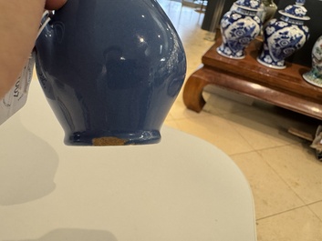 A very rare blue-glazed Dutch Delft jug with a mounted silver cover, 18th C.