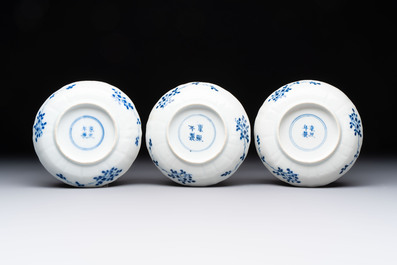 Ten Chinese blue and white cups and nine saucers, Kangxi mark, 19th C.