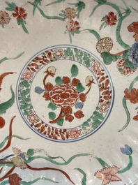A Dutch-decorated Chinese plate, an Imari-verte dish and a blue and white dish, Kangxi/Yongzheng