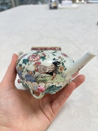 A Chinese famille rose 'roosters' covered teapot and two cups and saucers, Yongzheng