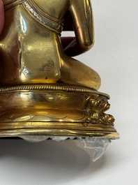 A fine Sino-Tibetan gilt-bronze figure of Buddha Shakyamuni, 17th C.