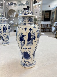 A Chinese blue and white garniture of four vases with figural design, Kangxi mark, 19th C.