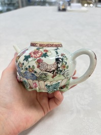 A Chinese famille rose 'roosters' covered teapot and two cups and saucers, Yongzheng