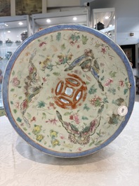 A Chinese famille rose celadon-ground garden seat, 19th C.
