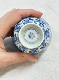 A set of four Chinese blue and white cups and saucers, flower mark, 19th C.