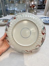 A Dutch-decorated Chinese plate, an Imari-verte dish and a blue and white dish, Kangxi/Yongzheng