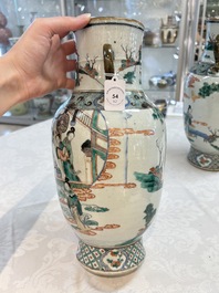 A pair of Chinese famille verte vases with narrative design, 19th C.