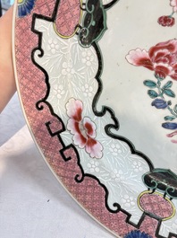 A large Chinese famille rose bianco-sopra-bianco 'peonies' dish, Yongzheng