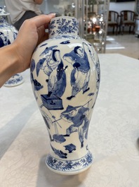 A Chinese blue and white garniture of four vases with figural design, Kangxi mark, 19th C.