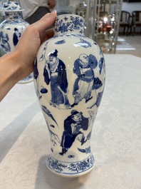 A Chinese blue and white garniture of four vases with figural design, Kangxi mark, 19th C.