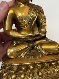 A fine Sino-Tibetan gilt-bronze figure of Buddha Shakyamuni, 17th C.